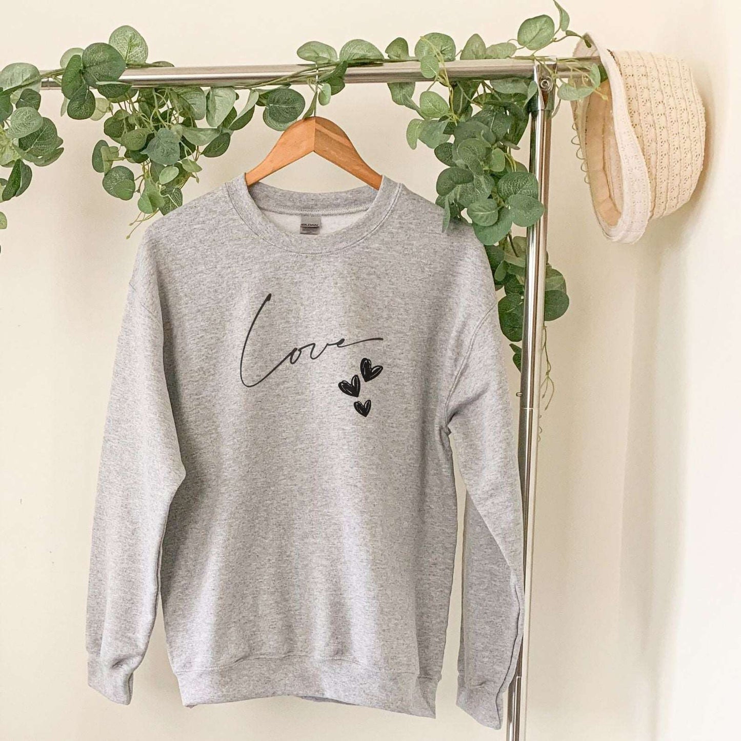Love Handcrafted Unisex Sweatshirts: Unique Designs for All - Available in All Sizes!"